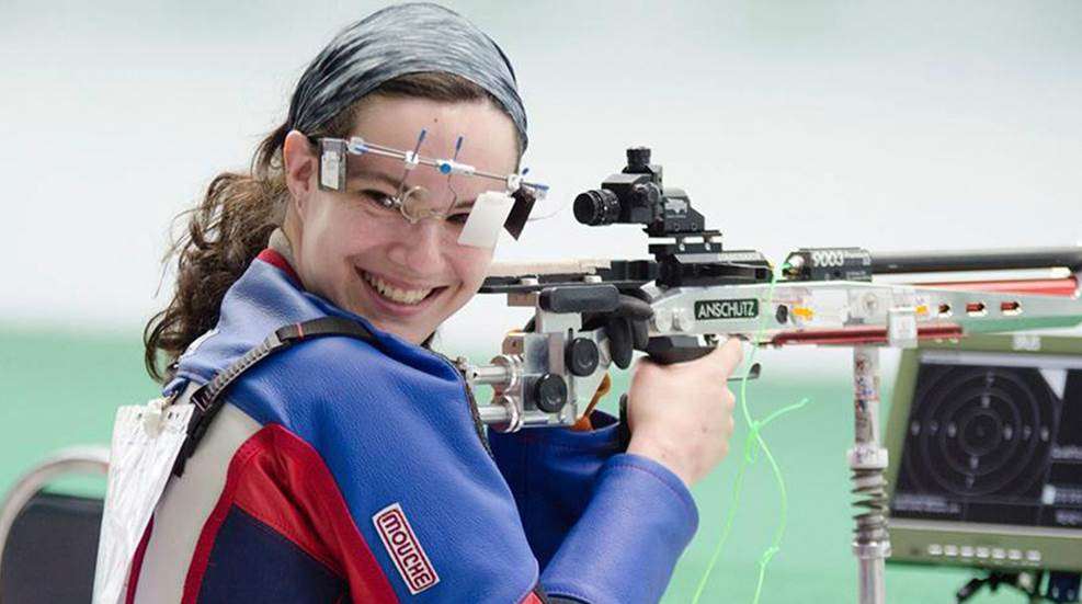 paralympic shooter mckenna dahl geer smiles after taking shot