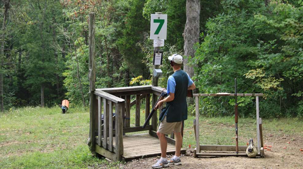 man preparing to shoot station 7