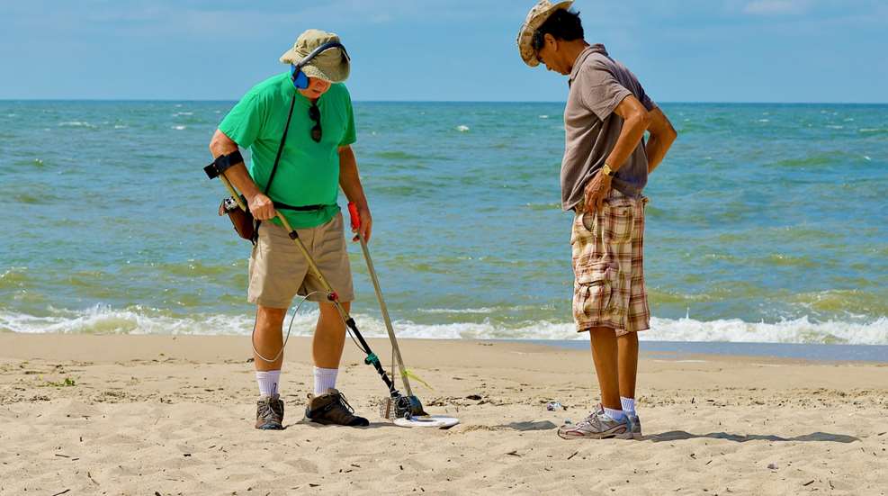 Family Metal Detecting At Beach Photo From Barb Melloni
