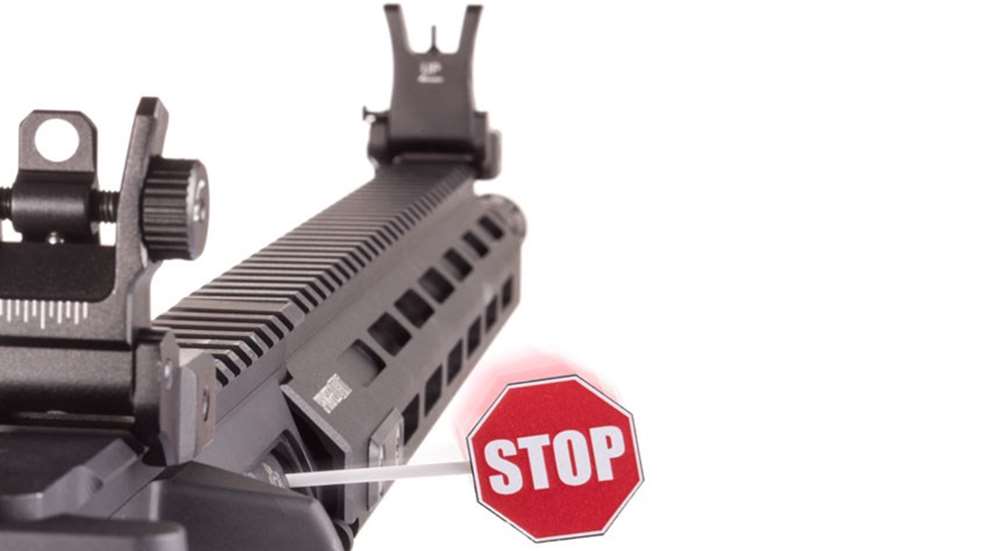 AR-15 with "Stop" flag in breech