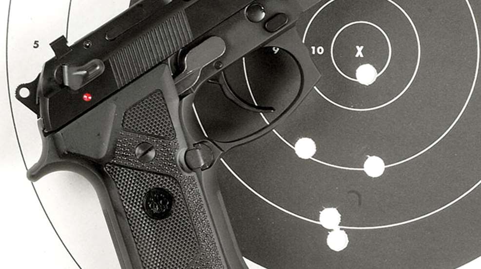 handgun juxtaposed with shot-up bullseye target