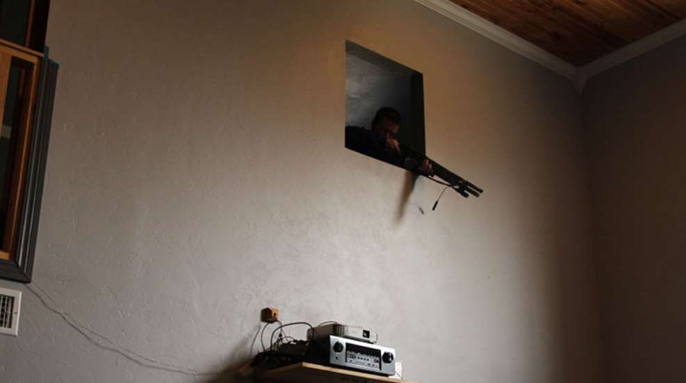 home defender with shotgun