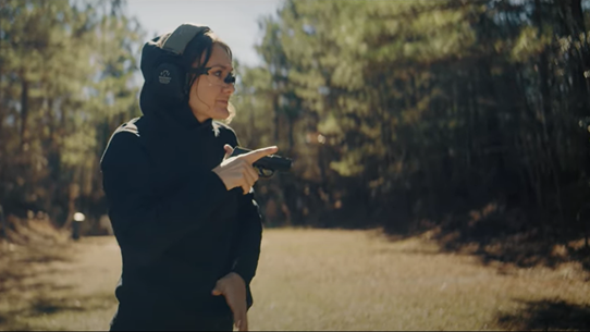 Lena Miculek presenting handgun