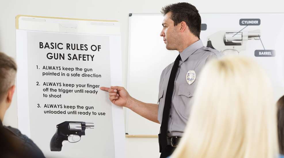 instructor teaching a gun safety class