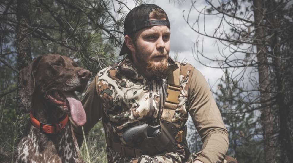 cody hunting wearing chest holster