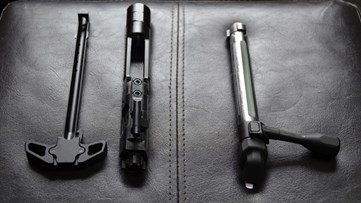 charging handle and bolt handle side by side